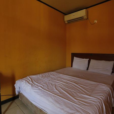 Oyo 93119 Guest House Leo Patra Muara Badak Luaran gambar