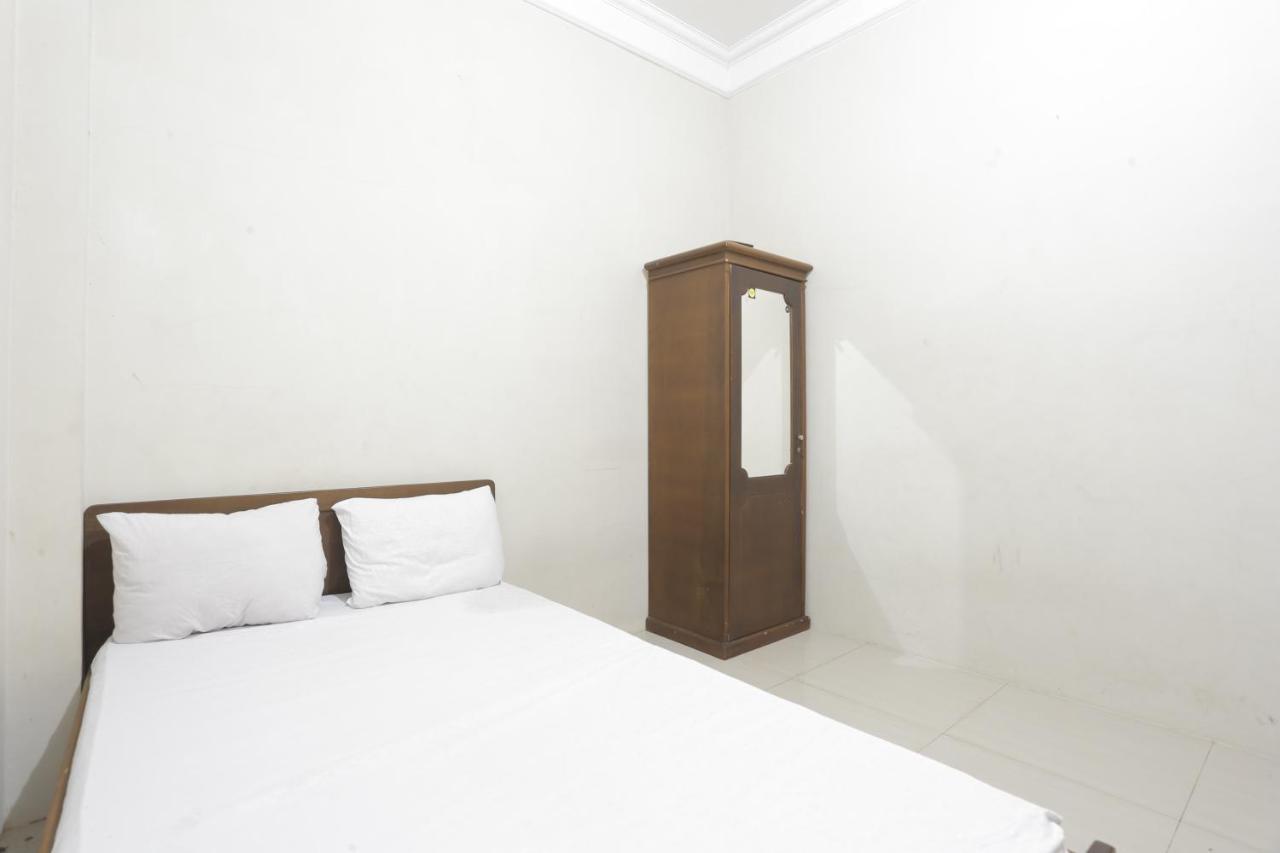 Oyo 93119 Guest House Leo Patra Muara Badak Luaran gambar