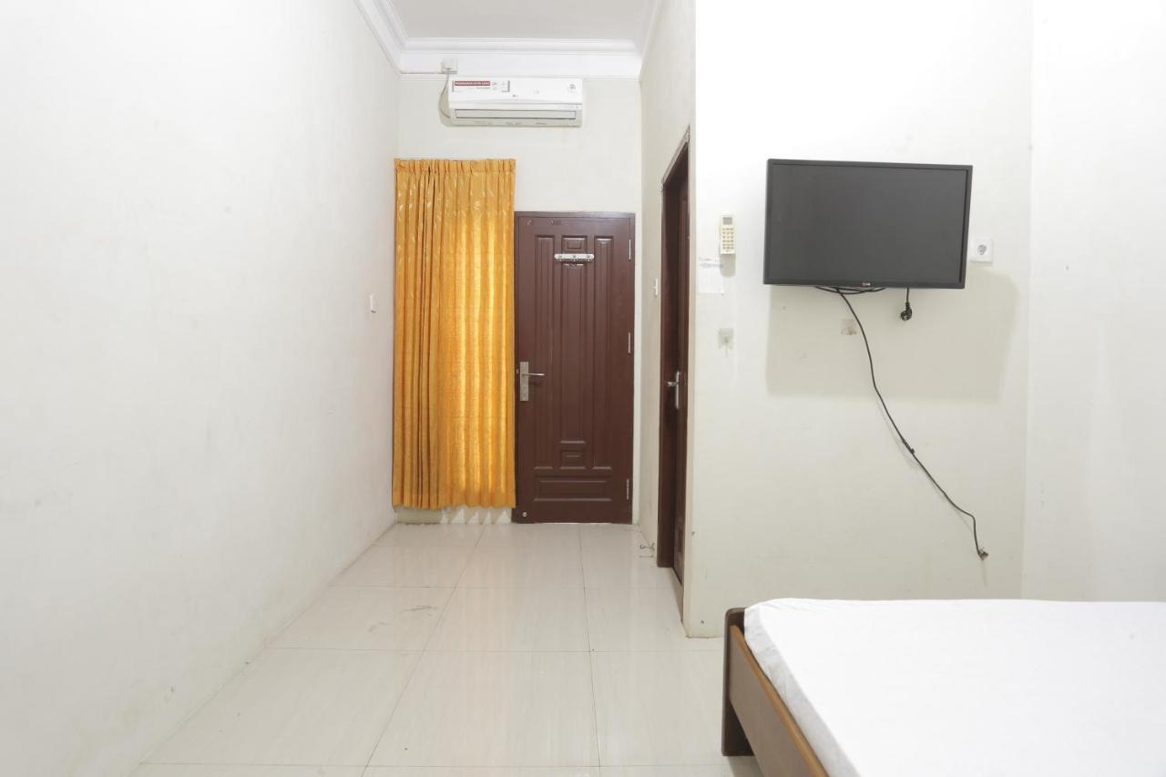 Oyo 93119 Guest House Leo Patra Muara Badak Luaran gambar
