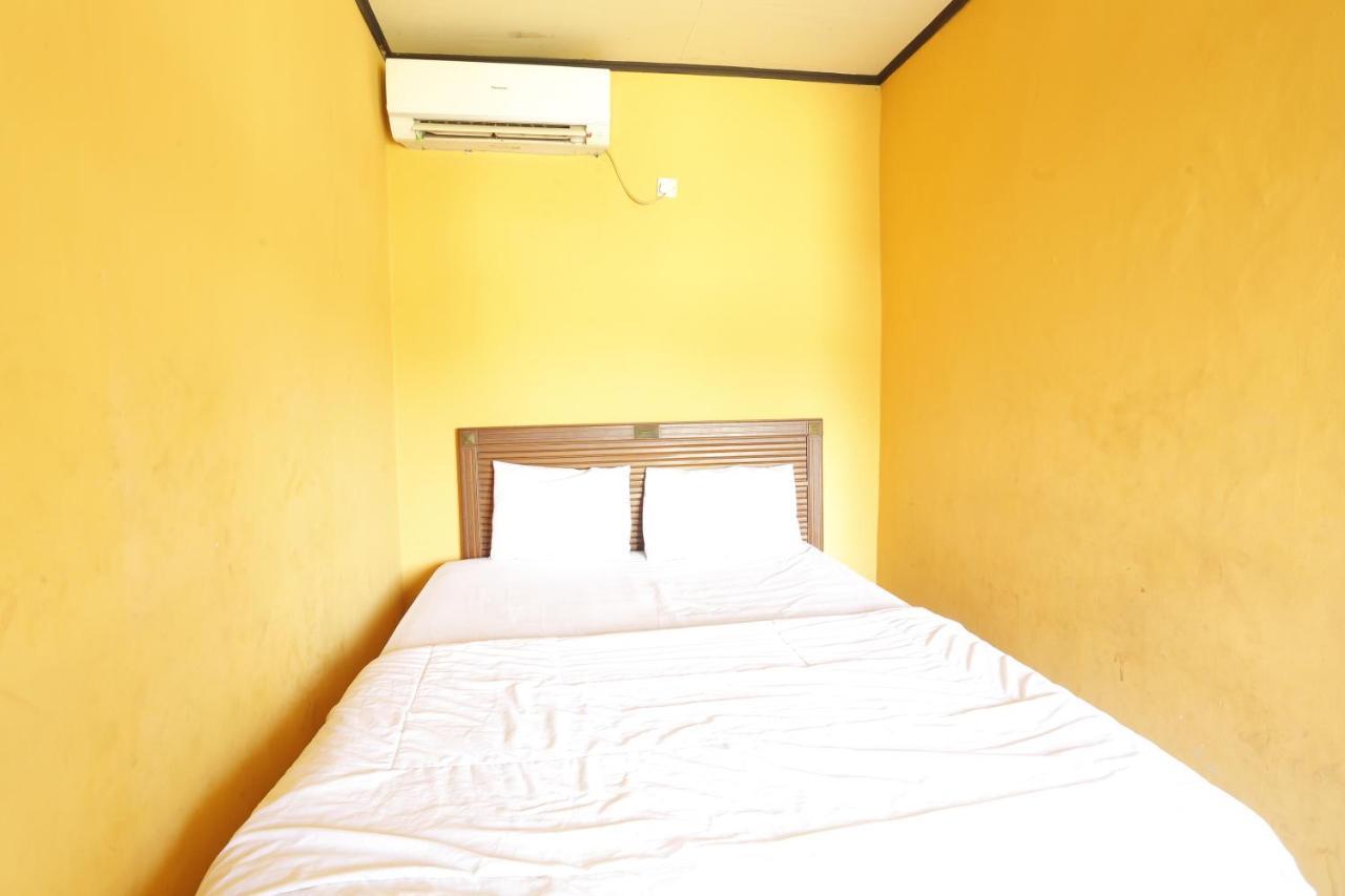 Oyo 93119 Guest House Leo Patra Muara Badak Luaran gambar