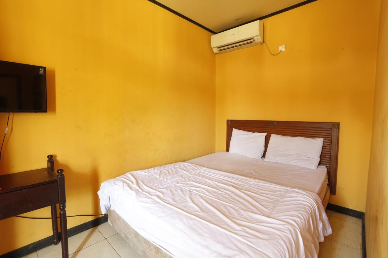 Oyo 93119 Guest House Leo Patra Muara Badak Luaran gambar