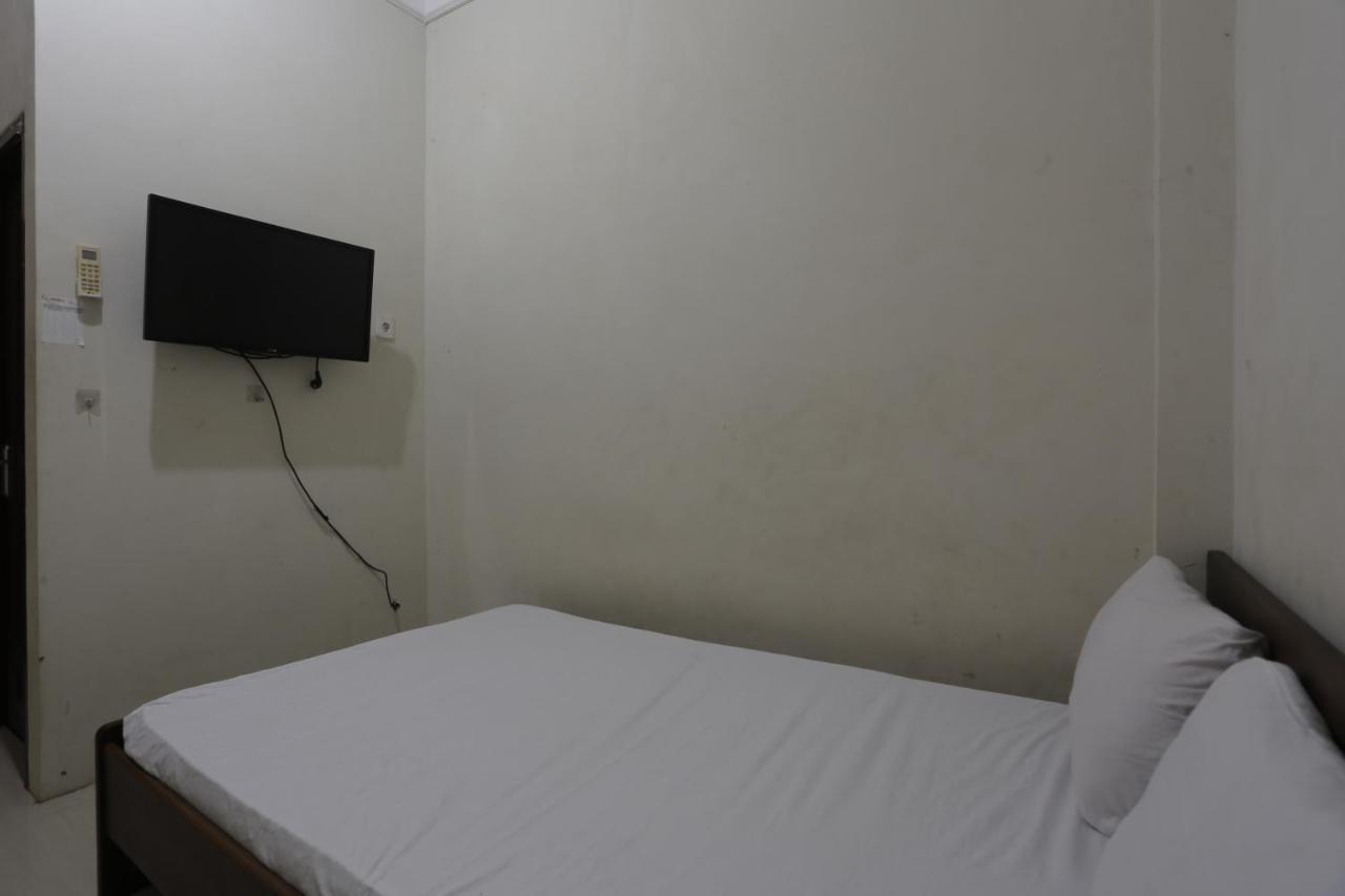 Oyo 93119 Guest House Leo Patra Muara Badak Luaran gambar