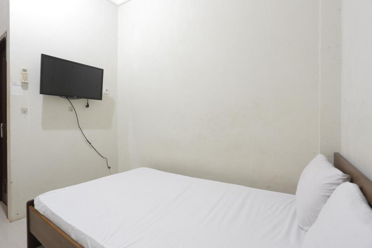 Oyo 93119 Guest House Leo Patra Muara Badak Luaran gambar