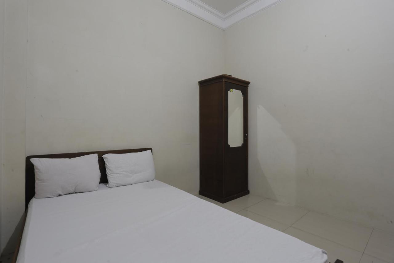 Oyo 93119 Guest House Leo Patra Muara Badak Luaran gambar