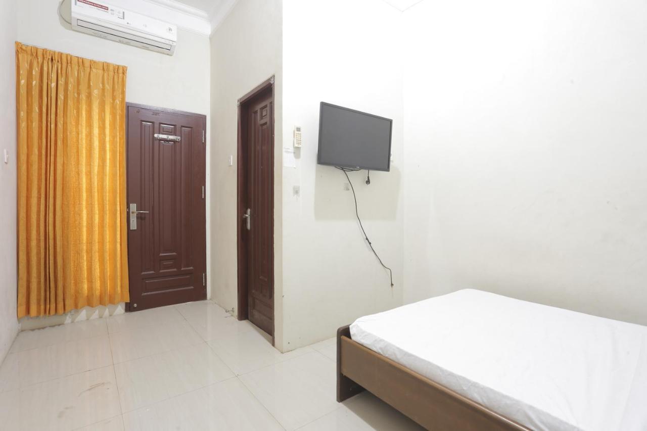 Oyo 93119 Guest House Leo Patra Muara Badak Luaran gambar