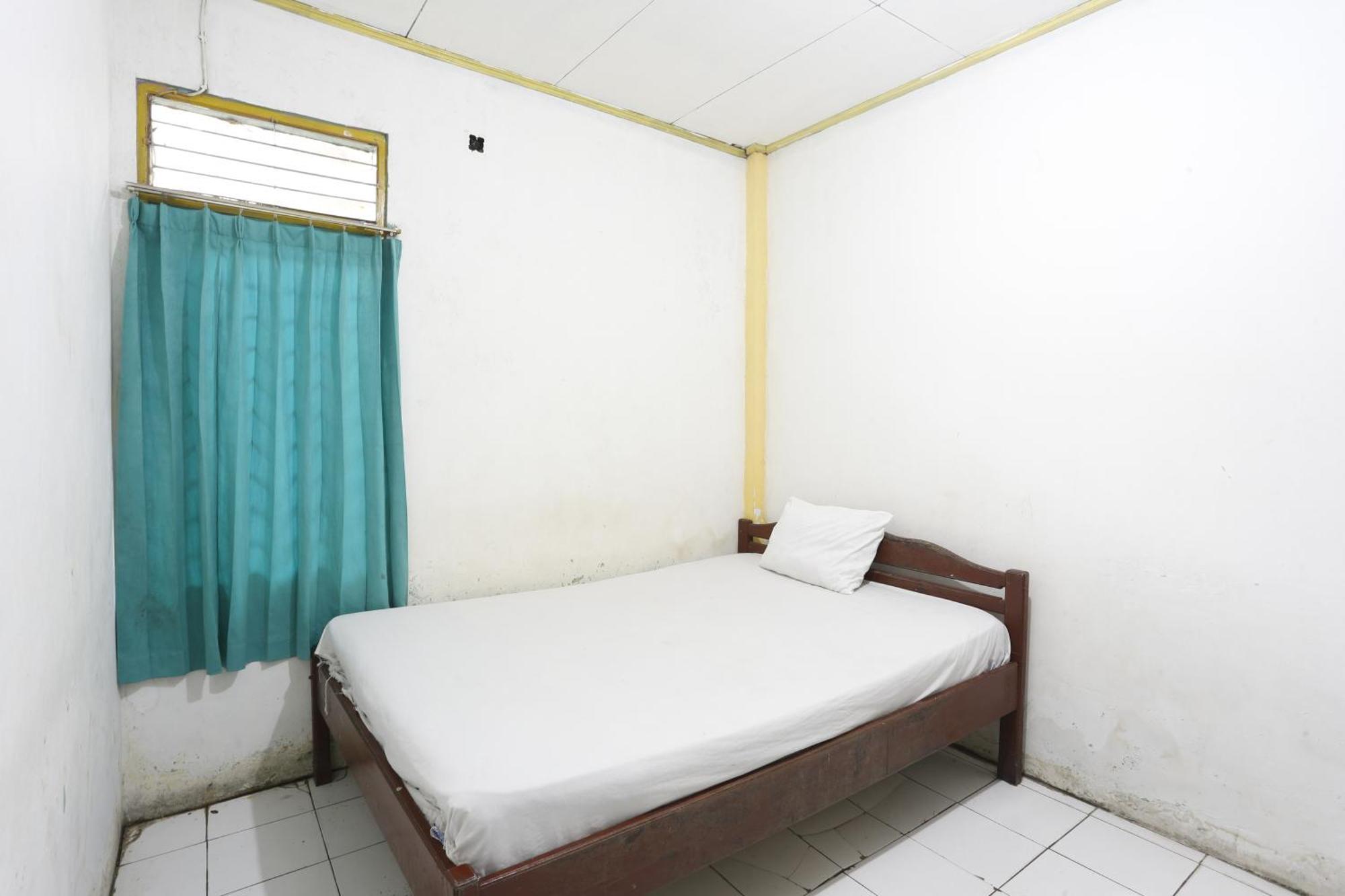 Oyo 93119 Guest House Leo Patra Muara Badak Luaran gambar